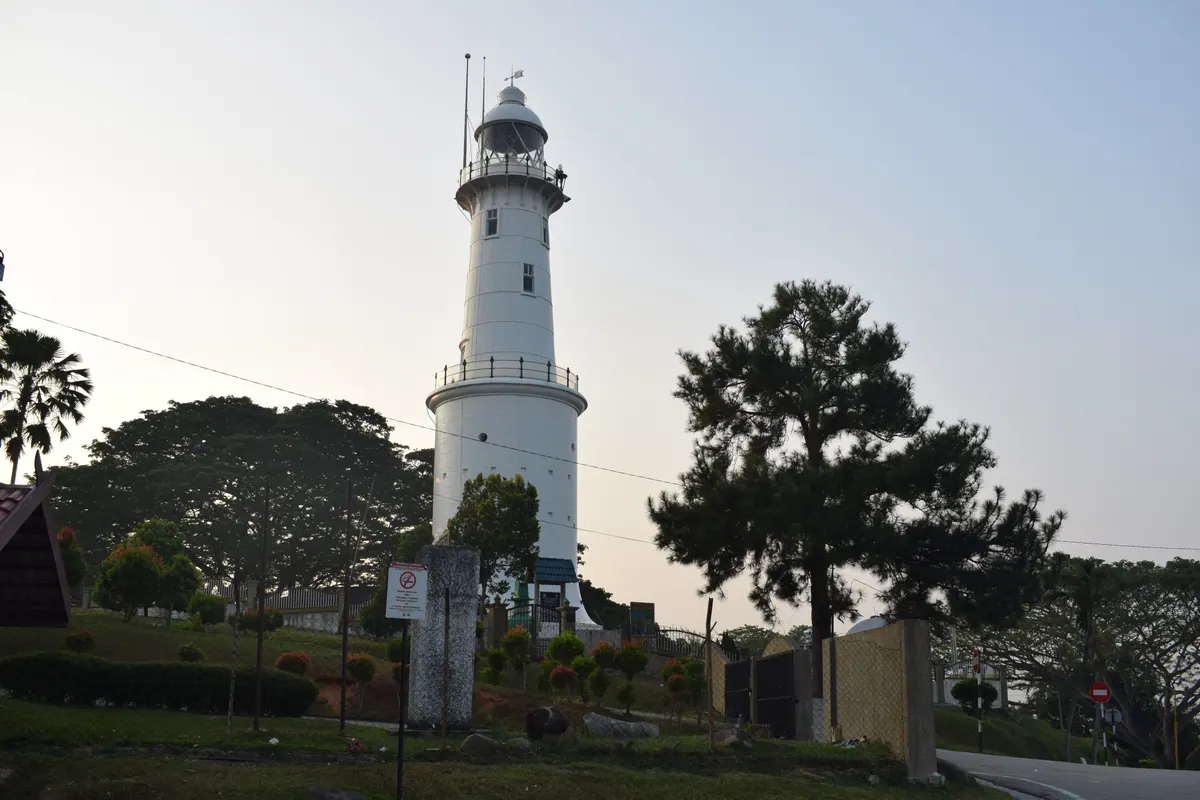 The white Altingsburg lighthouse on Bukit Melawati at Kuala Selangor