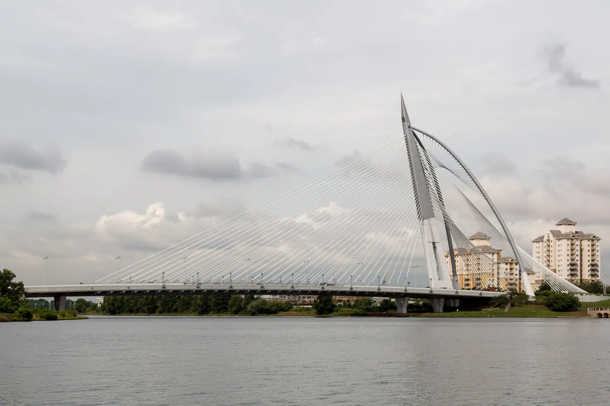 The white cable-stayed Seri Wawasan bridge across the lake at Putrajaya